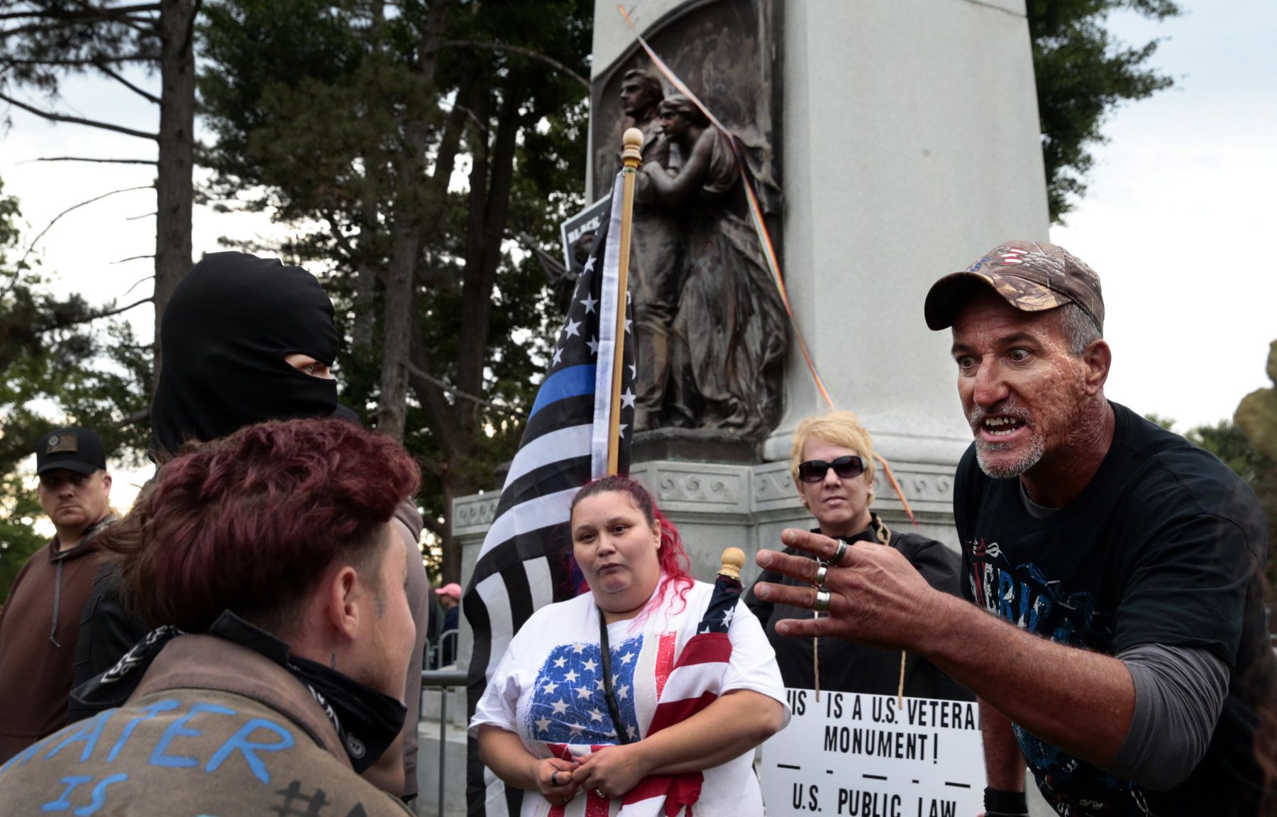 Protesters square off at Confederate Memorial in Forest Park